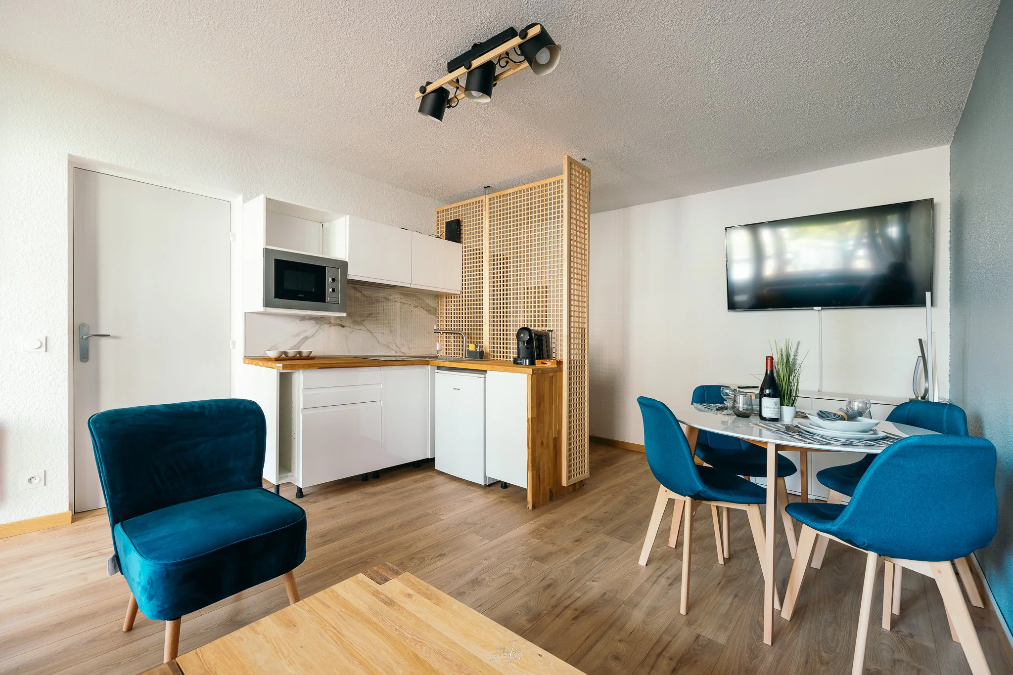 Photographe d’intérieur à Lyon – salon et cuisine photographiés pour un projet immobilier